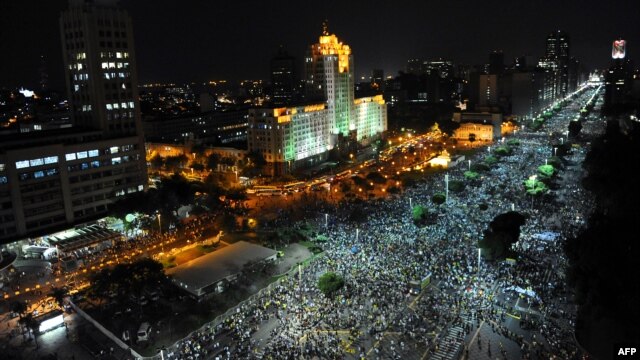 Hundreds of thousands of Brazilians, including these marchers in downtown Rio de Janeiro on June 20, have taken to the streets in an escalating expression of dissatisfaction with economic choices by the government.