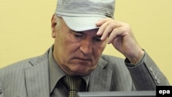 Former Bosnian Serb General Ratko Mladic sits in the courtroom during his initial appearance at the UN's Yugoslav war crimes tribunal in The Hague in June 2011.