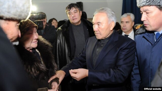 President Nursultan Nazarbaev (second from right) meeting with officials in the region a week after the deaths in Zhanaozen in December 2011.