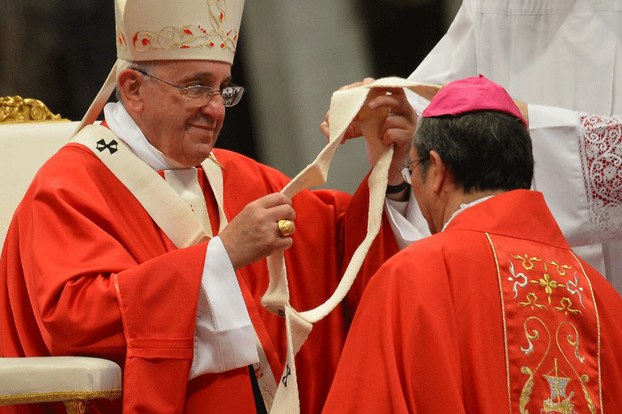 New archbishop of Ho Chi Minh City Paul Bui Van Doc receives the pallium from Pope Francis at St Peter's basilica in the Vatican, June 29, 2014.