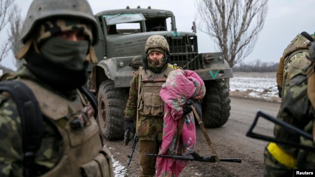 Ukrainian servicemen who fought in Debaltseve are seen near Artemivsk on February 19.