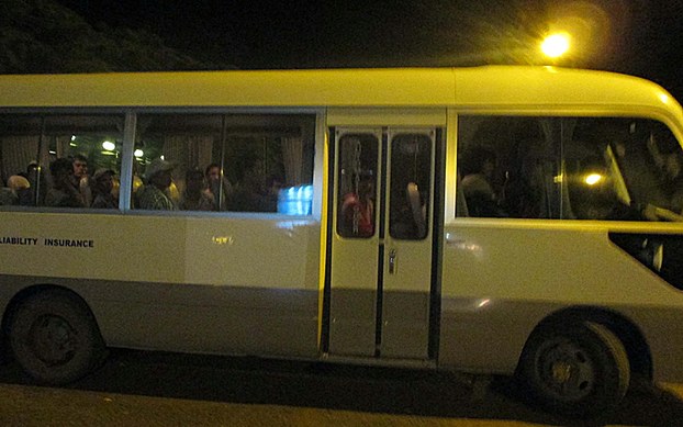 A van with Vietnamese Montagnards arrives in northeastern Cambodia's Ratanakri province, Oct. 7, 2015.