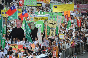 Protesters rally in Hong Kong, July 1, 2011.