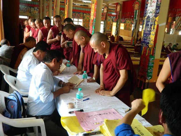 Buddhist monks line up in Bylakuppe, India, to cast their votes for a Tibetan government-in-exile, March 20, 2016.