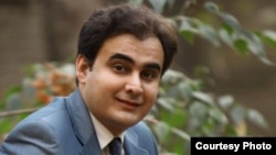 Iranian polotical activist Peyman Aref
