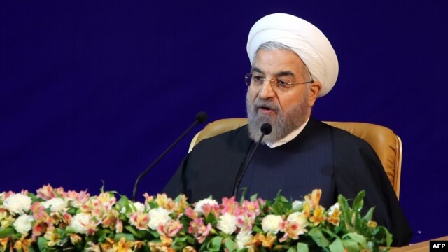 'Our economy will not prosper as long as it is monopolized [by the government],' said Iranian President Hassan Rohani. (file photo)