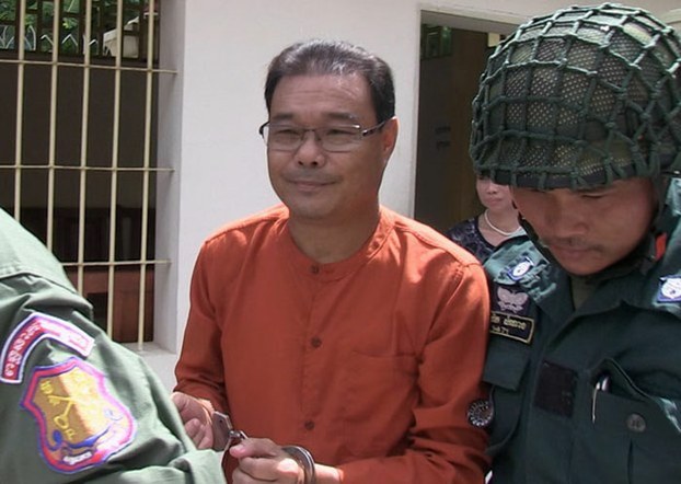 Sam Rainsy Party Sen. Hong Sok Hour is escorted from the supreme court back to Prey Sar Prison where he is being detained, June 22 , 2016.