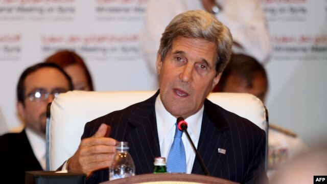 U.S. Secretary of State John Kerry addresses the 'Friends of Syria' meeting in the Qatari capital, Doha, on June 22.