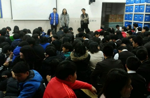 South Korean students take shelter at the South Korea-controlled island of Baengnyeong near disputed waters in the Yellow Sea as North Korea undergoes a live-fire drill, March 31, 2014.