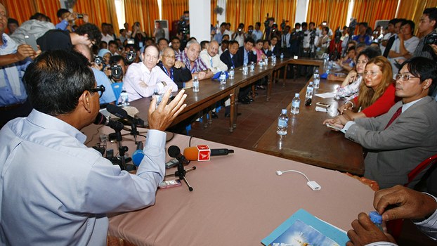 Then-president of the CNRP Sam Rainsy meets international observers for Cambodia's general election at his party headquarters in Phnom Penh, July 27, 2013.