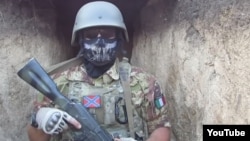 A screen grab from a video that purportedly shows Vladimir Verbitsky (aka 'Parma') involved with separatists in eastern Ukraine. He has since been arrested by the Italian police.