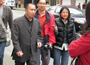 A file photo dated June 1, 2006 shows Chinese fugitive Lai Changxing (L) speaking to reporters in Vancouver, Canada.