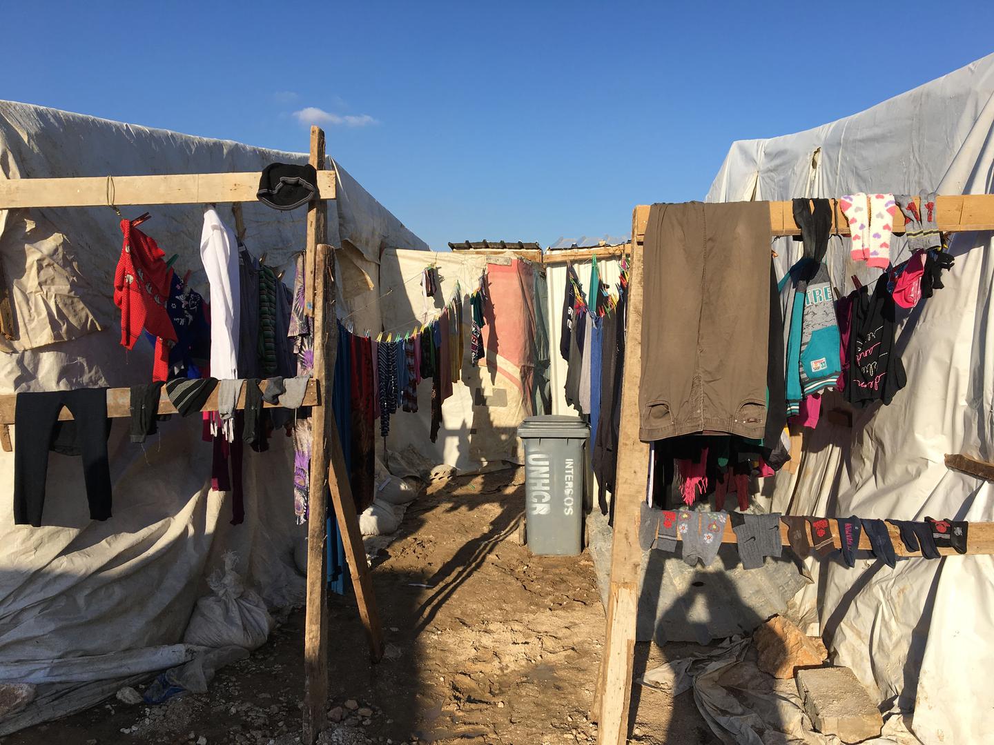 A clothesline in an informal tent settlement in Bar Elias, Bekaa Governorate, Lebanon. Refugees evicted from the Rayak air base area settled here in January 2018. The refugees say there was no procedure, no written notice, no opportunity to discuss or challenge their removal, and that it took place in extremely harsh conditions.