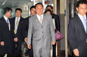 North Korea's deputy foreign minister Ri Yong-Ho (center) leaves after a meeting with his South Korean counterpart during ASEAN talks on Indonesia's Bali island, July 22, 2011.