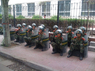 Chinese security personnel at the Inner Mongolia Normal University campus in the regional capital Hohhot, May 31, 2011.
