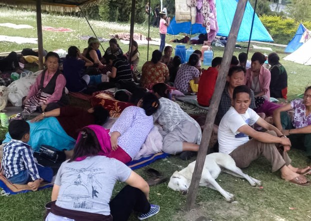 Tibetan survivors of Nepal earthquake shelter under a tent in Kathmandu, April 29, 2015.