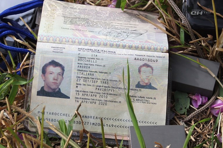 Andrea Rocchelli's passport is photographed on May 25, 2014, the day after his death. (AFP)