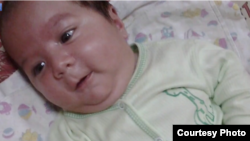 Five-month-old Umarali Nazarov died on October 14, 2015, a day after his tajik parents were briefly detained in St. Petersburg. (file photo)