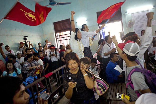 Family members shout and cheer after student activists are released from prison in Tharrawaddy, central Myanmar's Bago region, April 8, 2016.