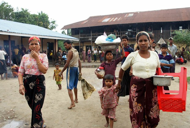 Rohingyas evacuate an at-risk area of Rakhine state ahead of Cyclone Mahasen, May 2013.