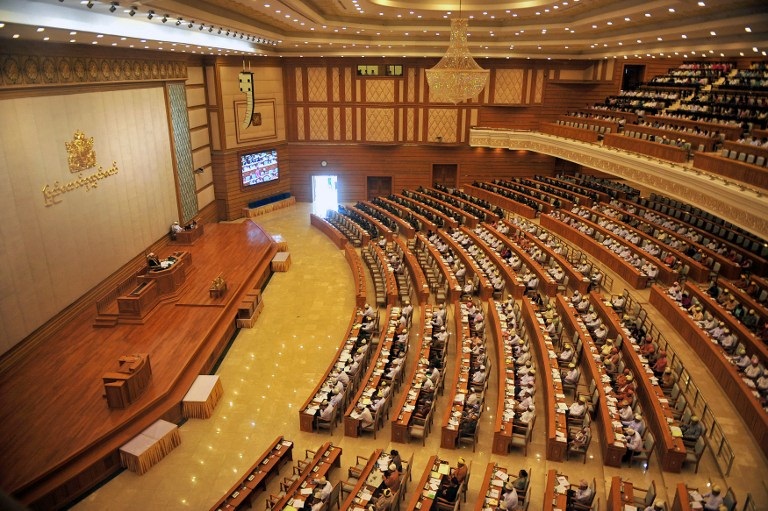 Myanmar lawmakers attend a parliamentary session in Naypyidaw, Aug. 16, 2013.