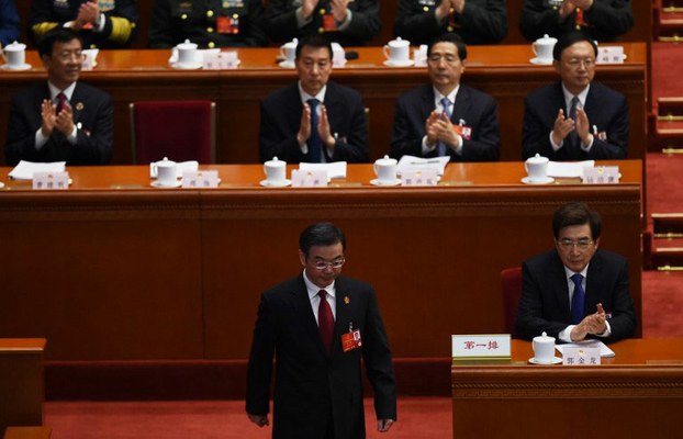 Zhou Qiang, President of the Supreme People's Court, prepares to deliver his work report to the National People's Congress in Beijing, March 13, 2016.
