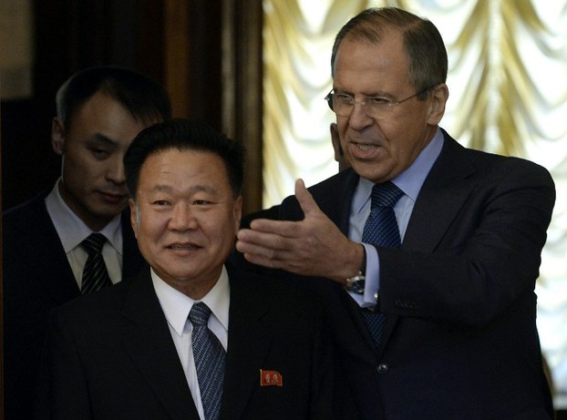 Russian Foreign Minister Sergei Lavrov (R) welcomes North Korean leader Kim Jong Un's special envoy Choe Ryong Hae during their meeting in Moscow, Nov. 20, 2014.
