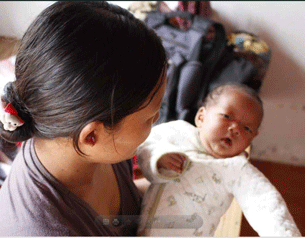 A June 2012 dated photo of a Kachin refugee who gave birth in China's Yunnan Province, after being forced back to Burma.