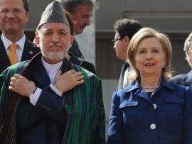 Afghan President Hamid Karzai (left) and U.S. Secretary of State Hillary Clinton (file photo)