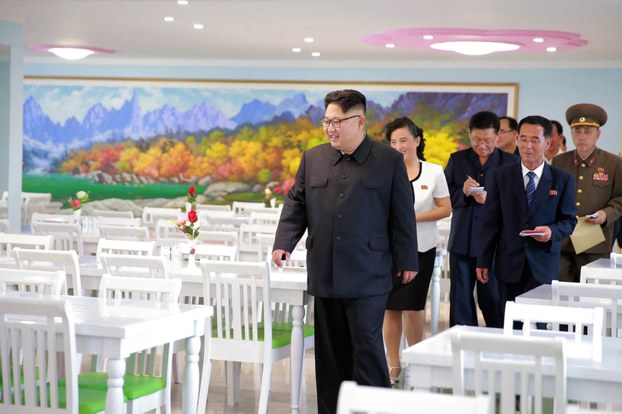 This undated picture released from North Korea's official Korean Central News Agency shows North Korean leader Kim Jong Un (C) inspecting a newly built secondary school in Pyongyang, July 13, 2016.