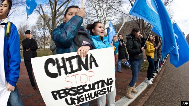 Uyghur activists protest against the visit of Chinese President Hu Jintao outside the White House in Washington, D.C., in 2011.