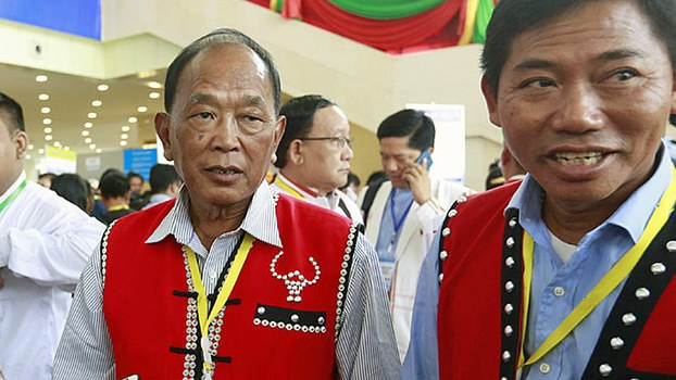 Zhao Guo An (L), head of the foreign affairs office of the China-backed United Wa State Army (UWSA), attends the second session of Myanmar's 21st Century Panglong Conference in Naypyidaw, May 24, 2017.