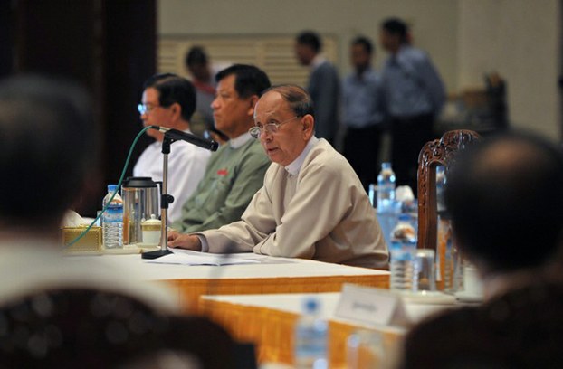 Myanmar President Thein Sein attends a meeting between Union ministers and Yangon-based political parties at the parliament building in Yangon Nov. 26, 2014.