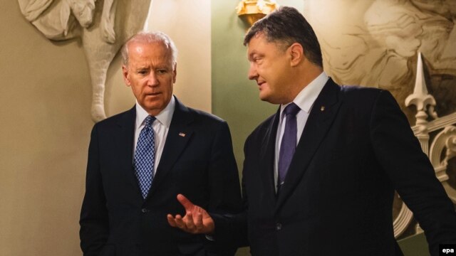Ukrainian President Petro Poroshenko (right) with U.S. Vice President Joe Biden in Kyiv late last year.