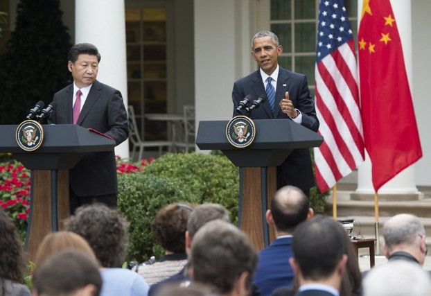US President Barack Obama and Chinese President Xi Jinping hold a joint-press conference in the Rose Garden as part of a state visit at the White House in Washington, Sept. 25, 2015.