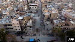 An aerial view shows destruction in Al-Bab on March 29, a month after Turkish-backed rebels recaptured the northern Syrian town from Islamic State.