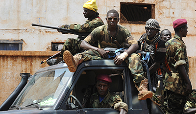 Seleka fighters cruise a neighborhood in Bangui. (AFP/Sia Kambou)