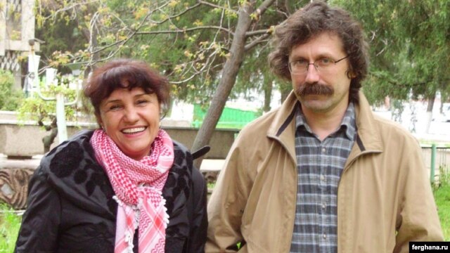 Photojournalist Umida Ahmedova (left) with Oleg Karpov in an undated photo