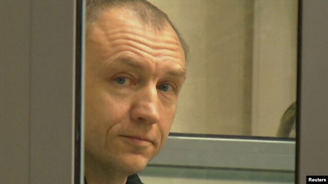Eston Kohver is shown in a defendants' cage during a court hearing in Pskov, Russia, on June 2.