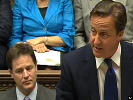 British Prime Minister David Cameron announces the UN resolution in parliament on June 8.