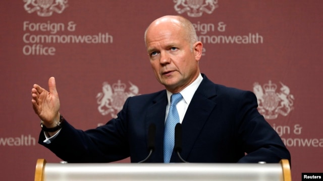 British Foreign Secretary William Hague was speaking after foreign ministers from the Friends of Syria group met with Syrian opposition leaders in London on October 22 to persuade them to attend a major peace conference in Geneva next month.