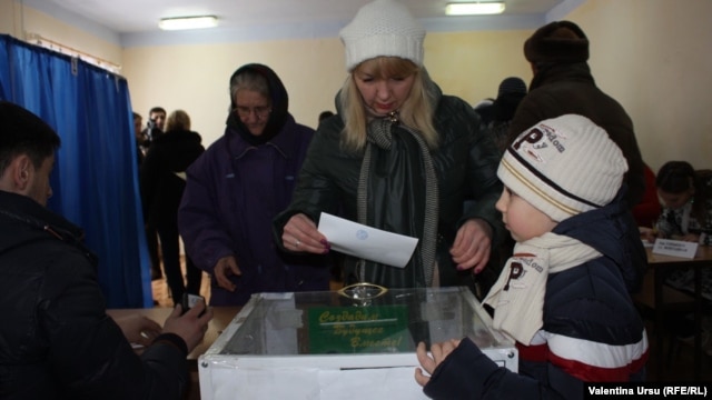 People vote during a referendum in the southern Moldovan autonomous region of Gagauzia on February 2.