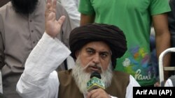Khadim Hussain Rizvi speaks to supporters during a protest following the Supreme Court's decision to acquit Pakistani Christian woman Asia Bibi of blasphemy, in Lahore on November 2.