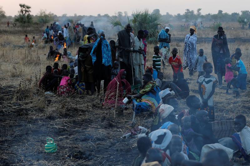 People wait to be registered prior to a food distribution carried out by the United Nations World Food Programme (WFP) in Thonyor, Leer state, South Sudan, February 25, 2017.