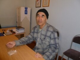 Azimjan Askarov during a visit by his wife to his prison in March