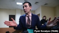 Russian yoga teacher Dmitry Ugay attends a court hearing in St. Petersburg on January 18.