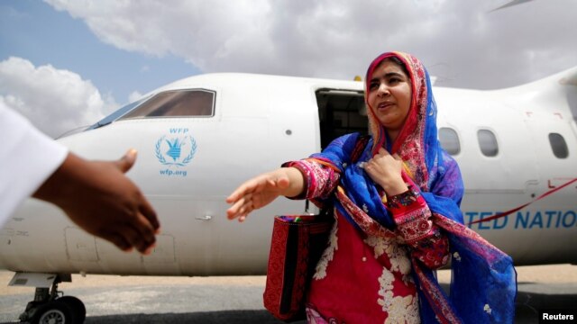 Pakistani Nobel Peace Prize laureate Malala Yousafzai arrives to celebrate her 19th birthday at the Dadaab refugee camp near the Kenya-Somalia border on July 12.