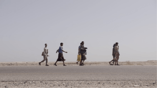 Ethiopian migrants walking on road in Shabwa governorate, Yemen.