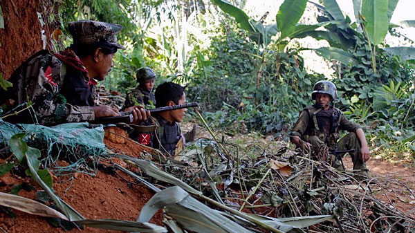 Soldiers from the Kachin Independence Army secure an area on Hka Ya mountain in northern Myanmar's Kachin state in a file photo.