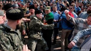 Cossacks break up opposition rally in Moscow, May 5